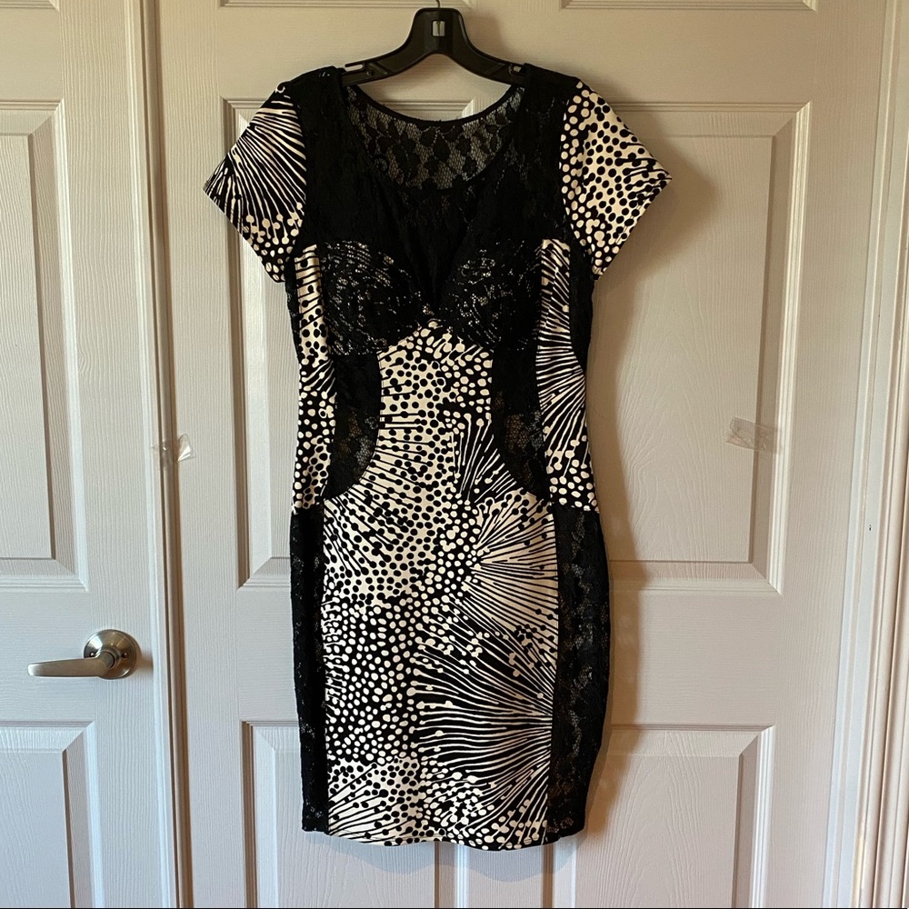 Black & white dress with lace accents.